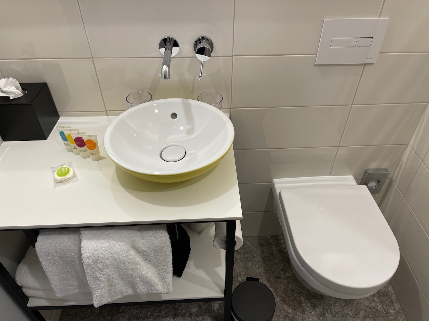 a sink and toilet in a bathroom