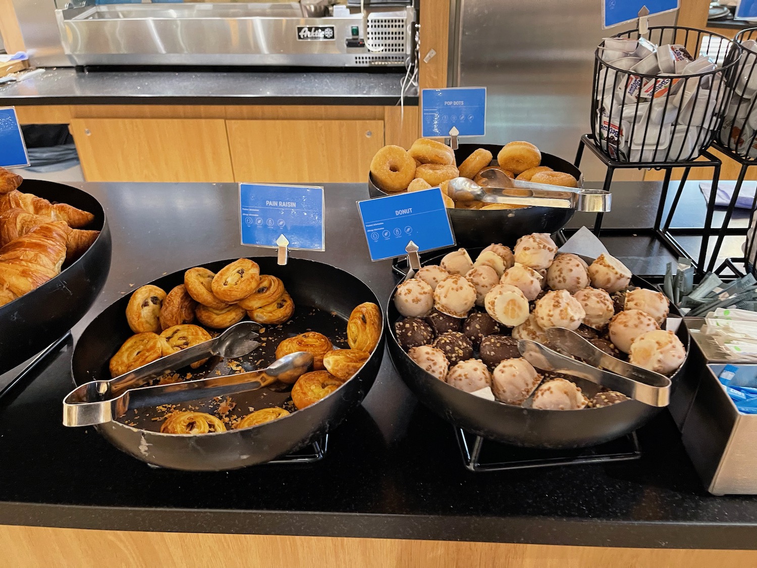 a group of bowls of pastries