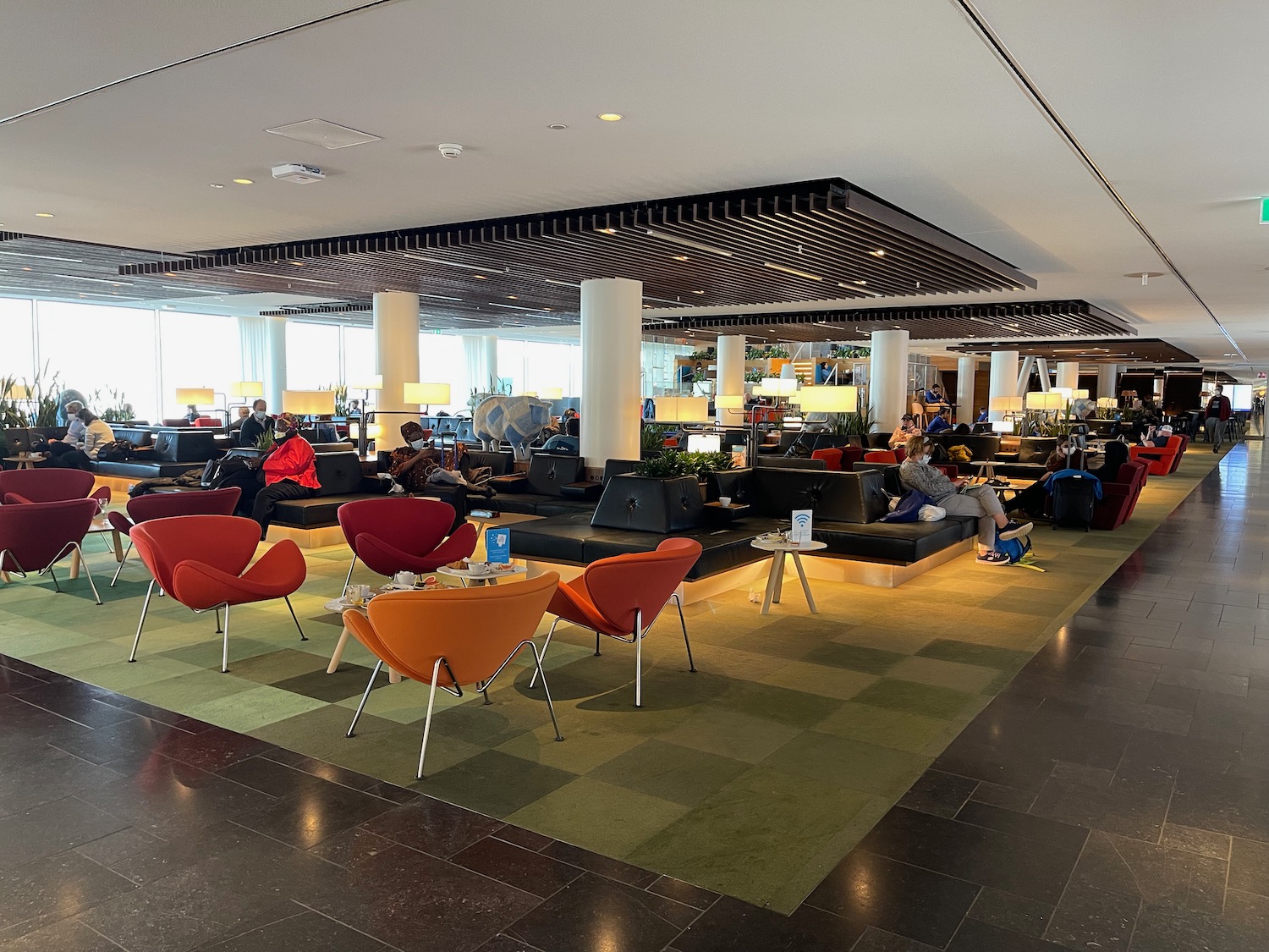 a large room with many chairs and tables