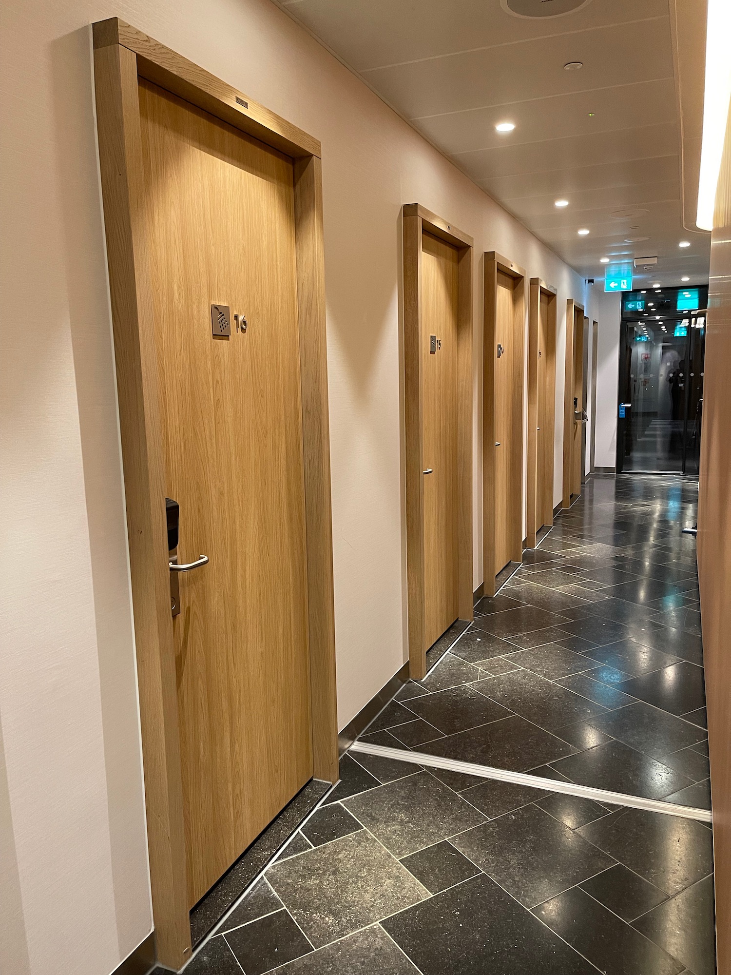 a row of doors in a hallway