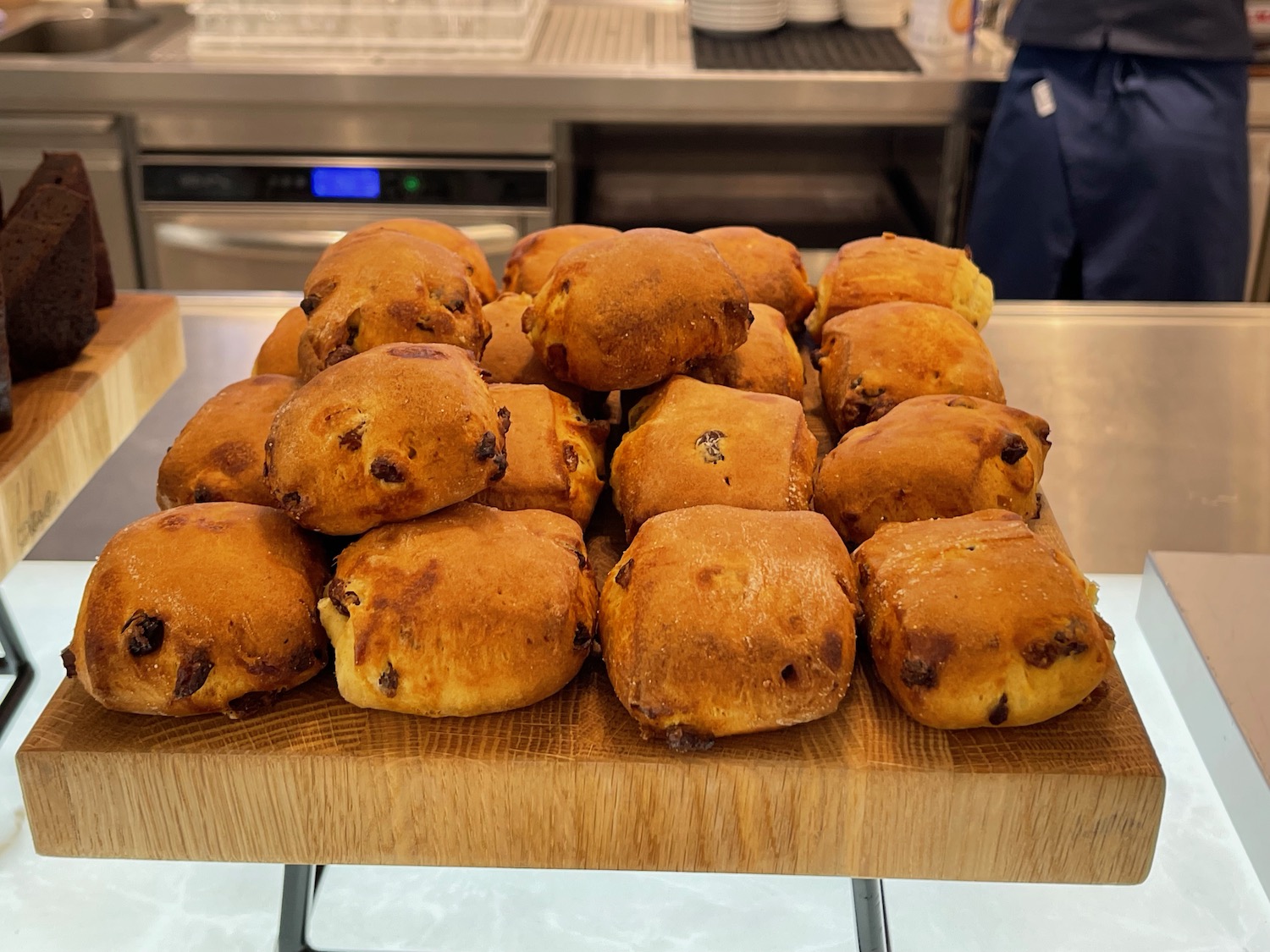 a pile of baked goods on a wood surface