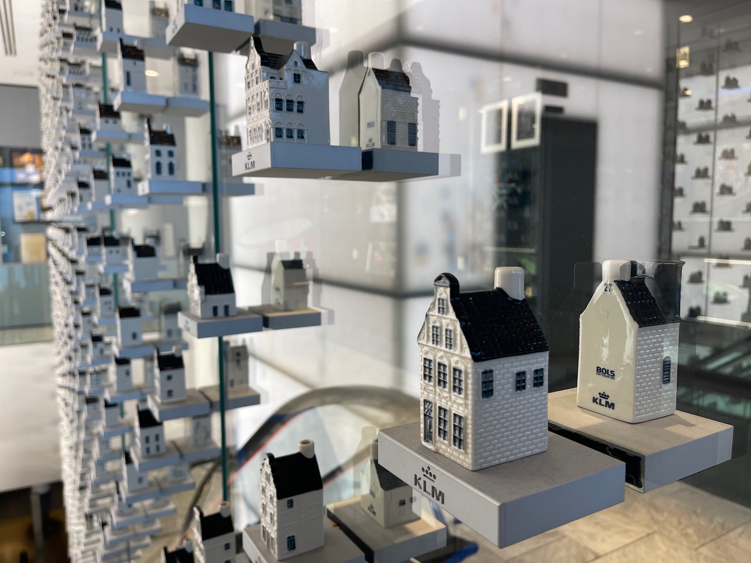 a group of small white houses on shelves