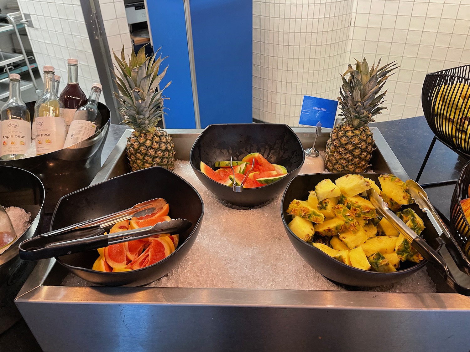 bowls of fruit and vegetables in bowls on a counter