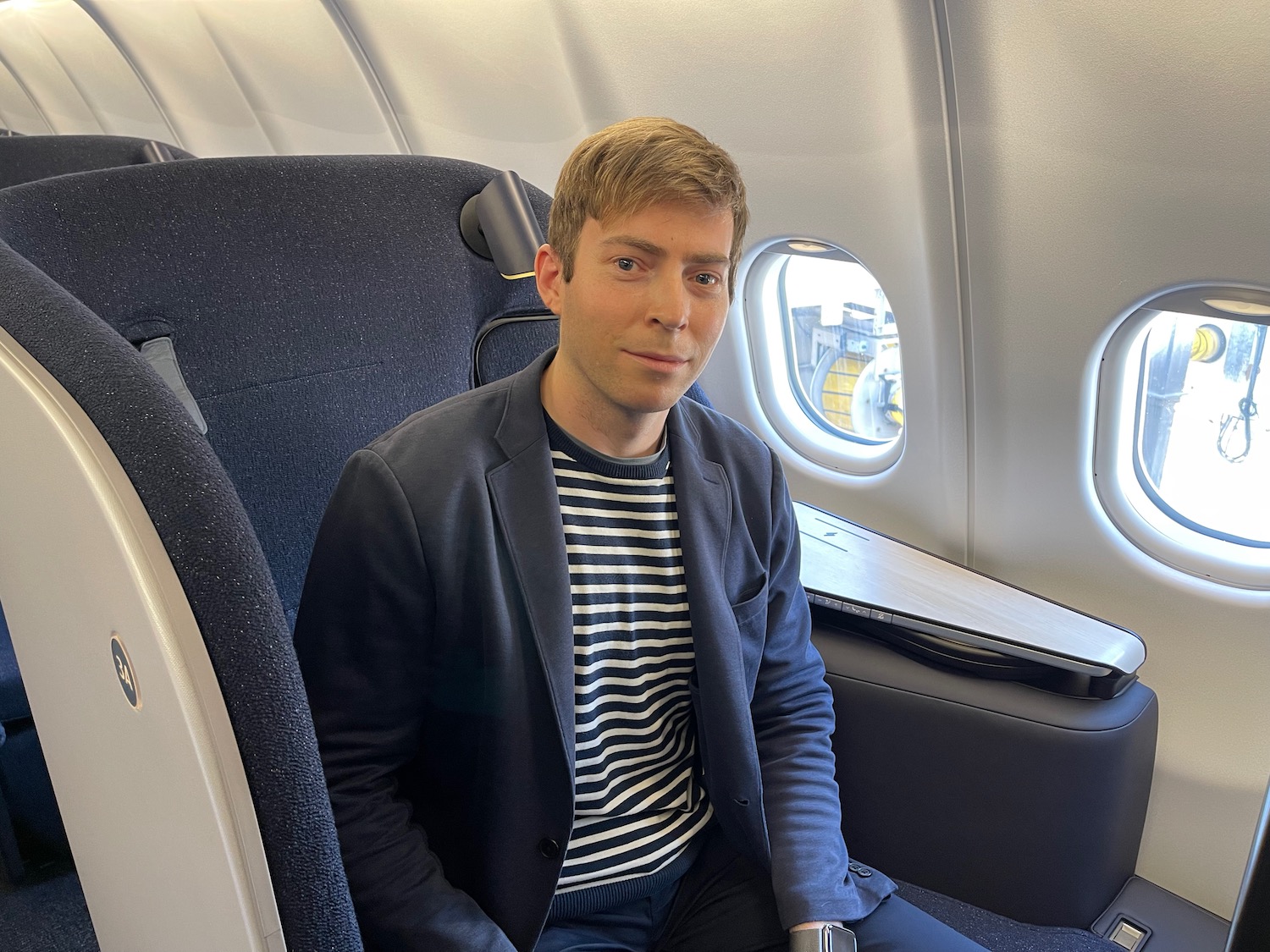 a man sitting in a plane