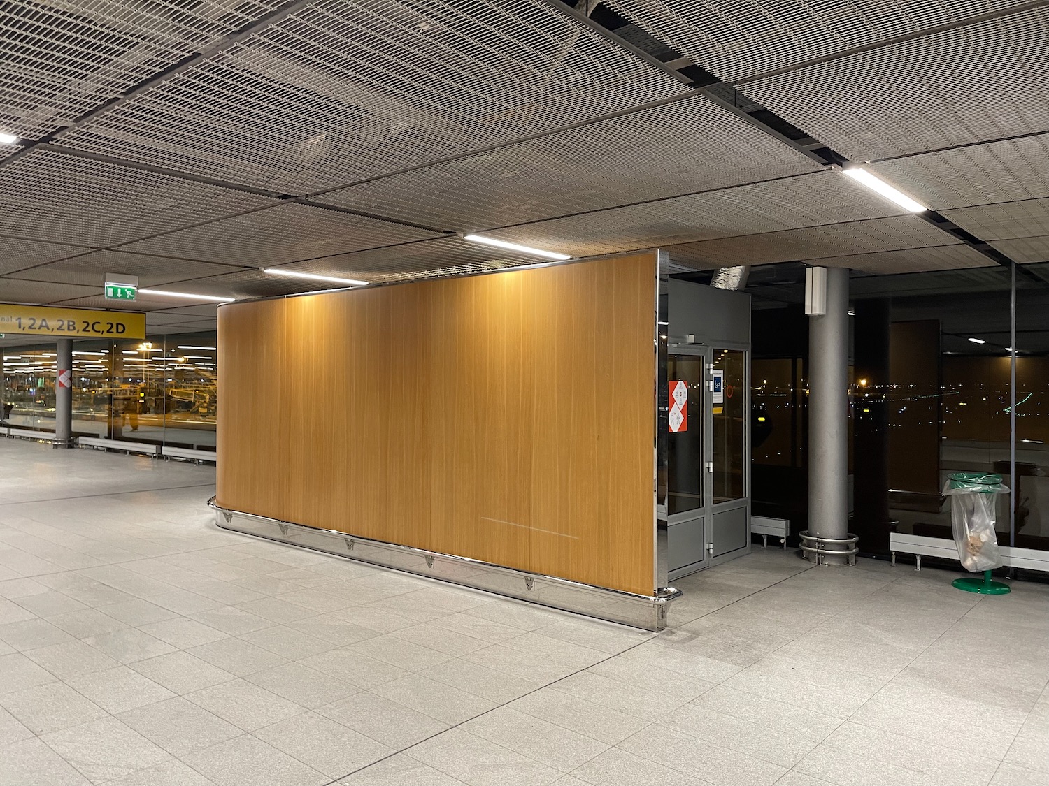 a wooden paneled wall in a building