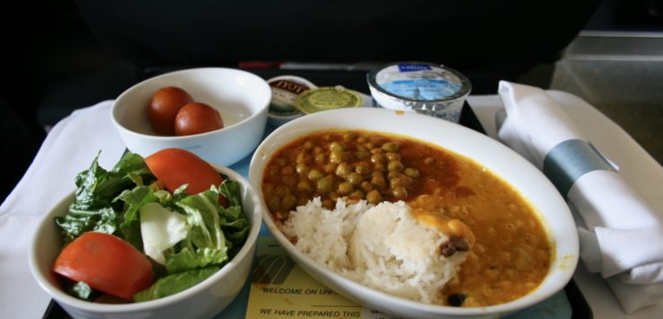 a plate of food on a tray