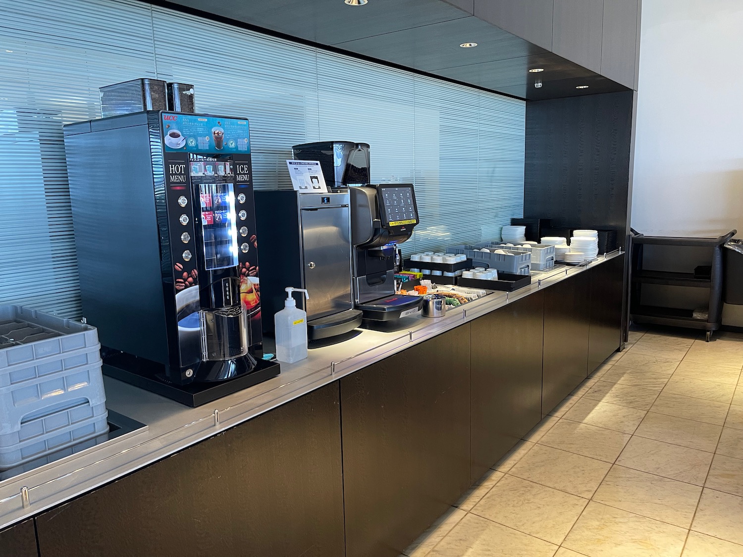 a coffee machine and coffee maker on a counter