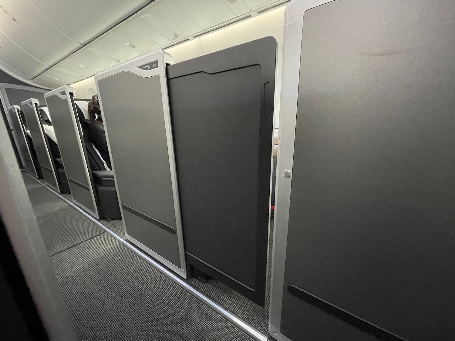 a row of black and silver doors