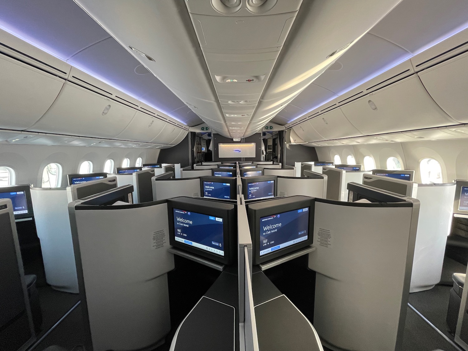 a row of computers in an airplane