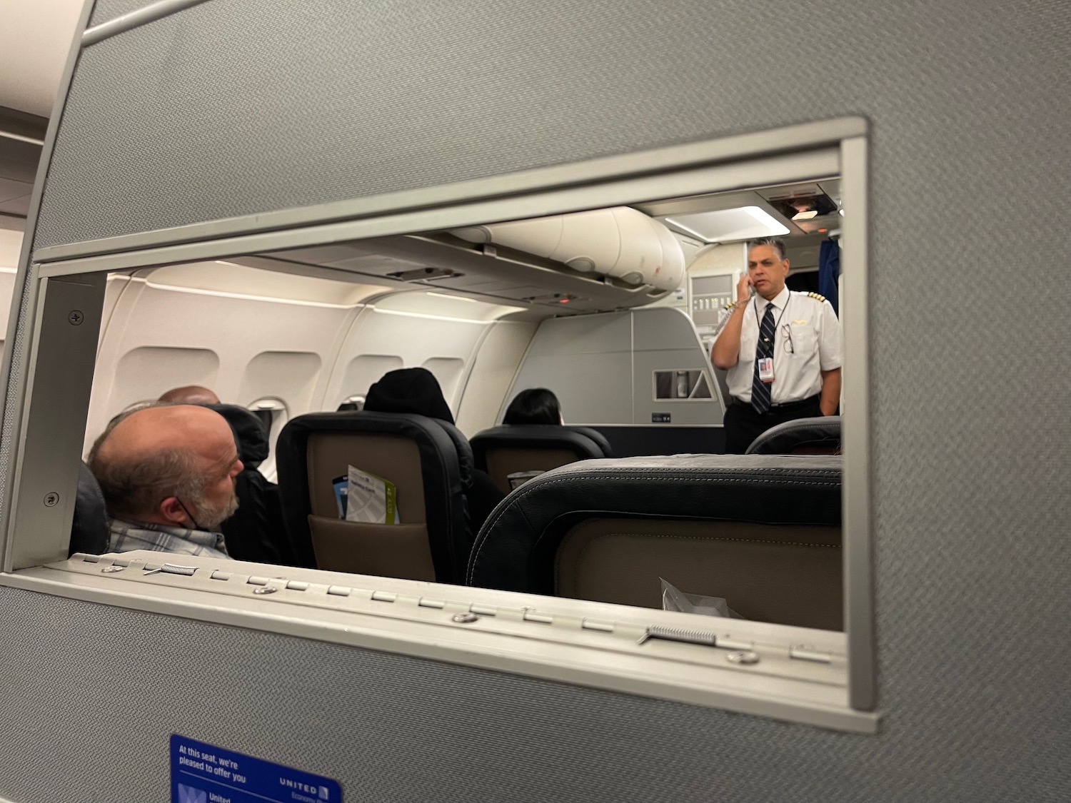 a man standing in an airplane