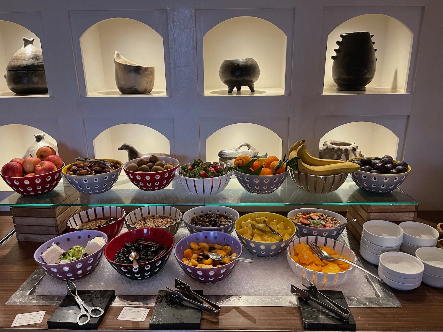 a display of bowls of food