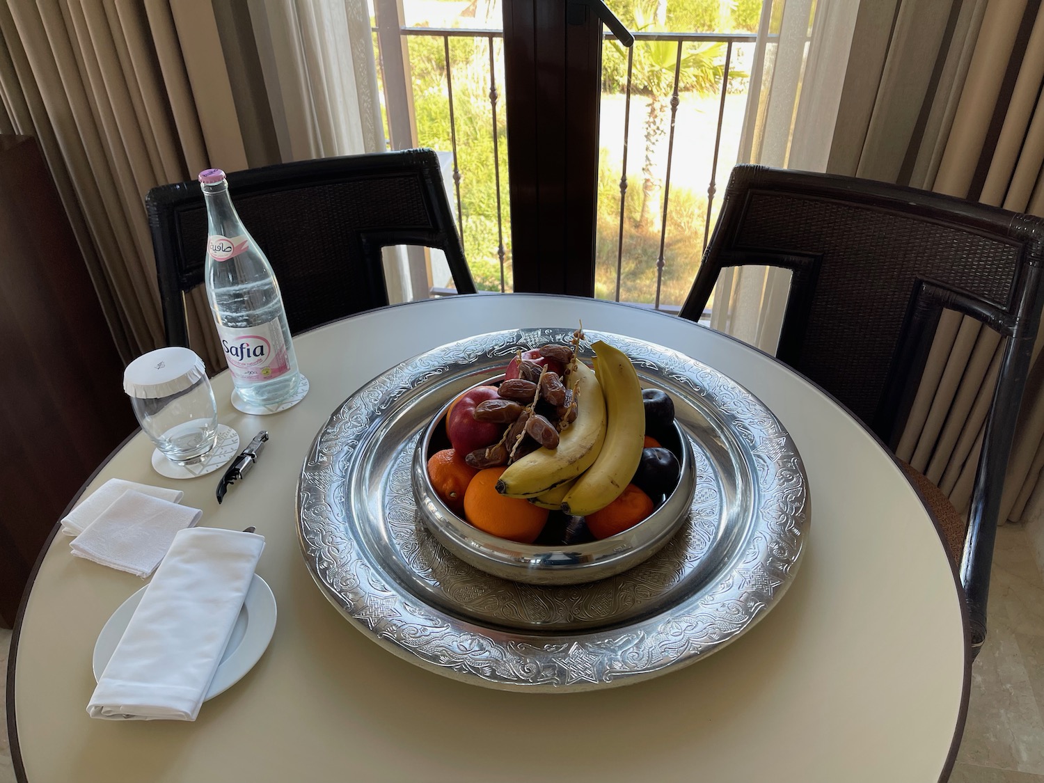 a bowl of fruit on a table