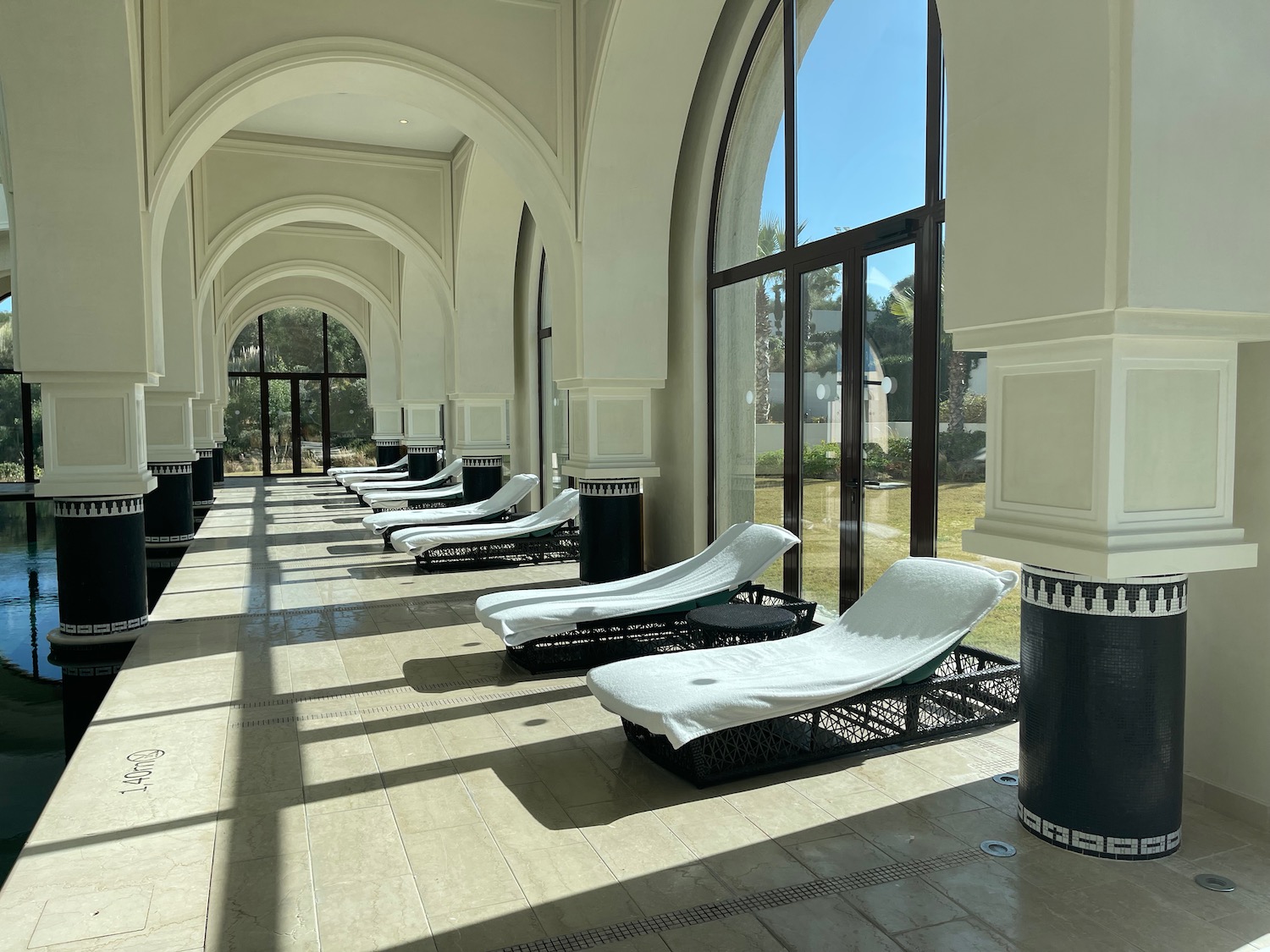 a row of lounge chairs in a room