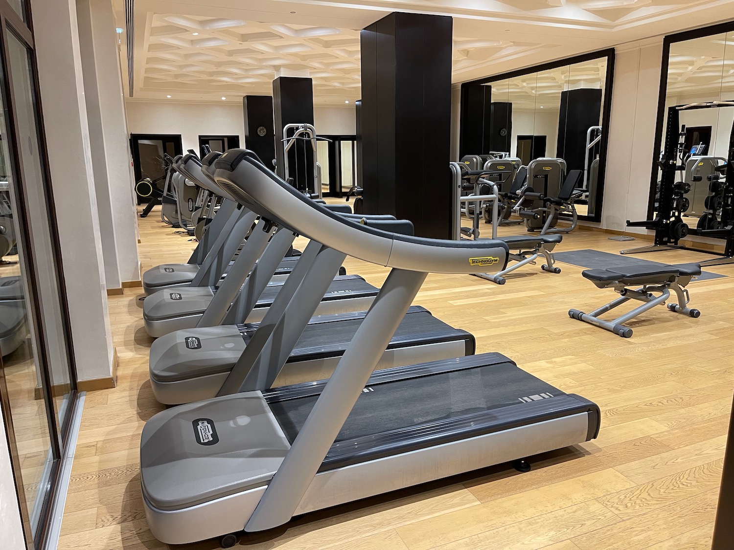 a group of treadmills in a gym