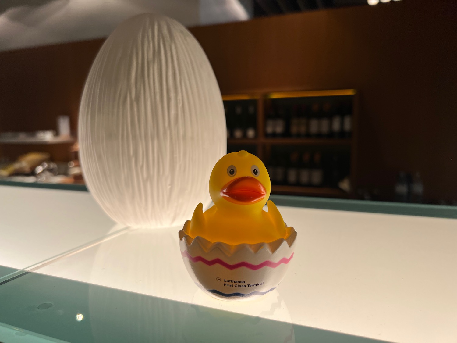 a toy duck in an egg shaped egg