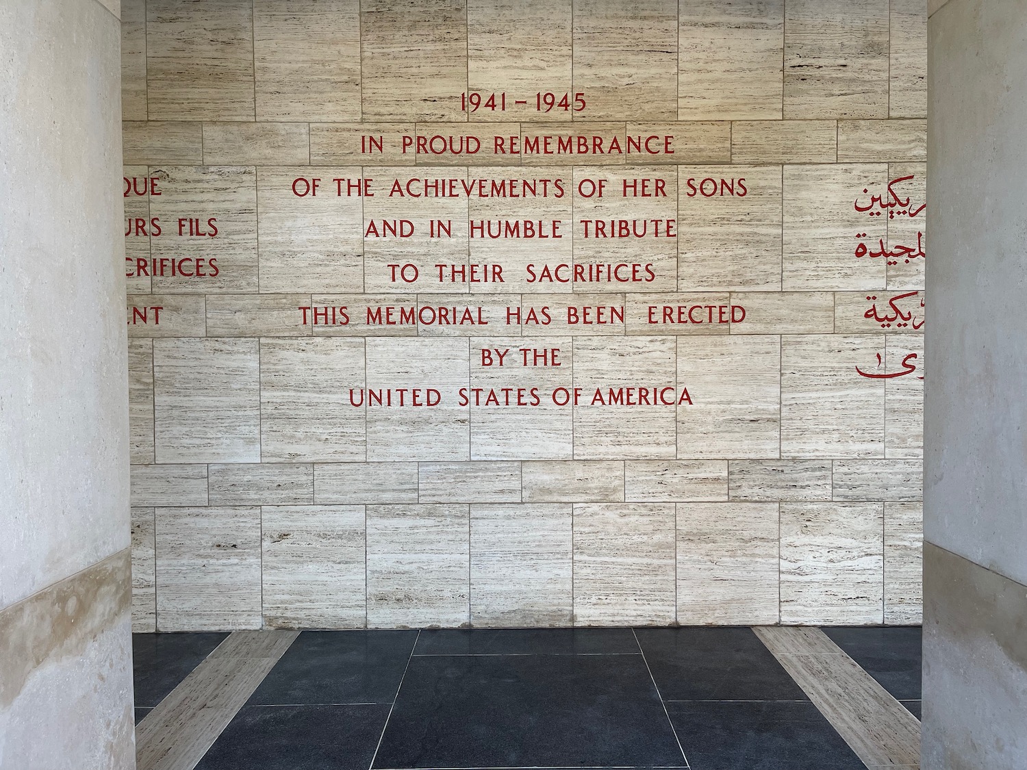 a wall with red writing on it