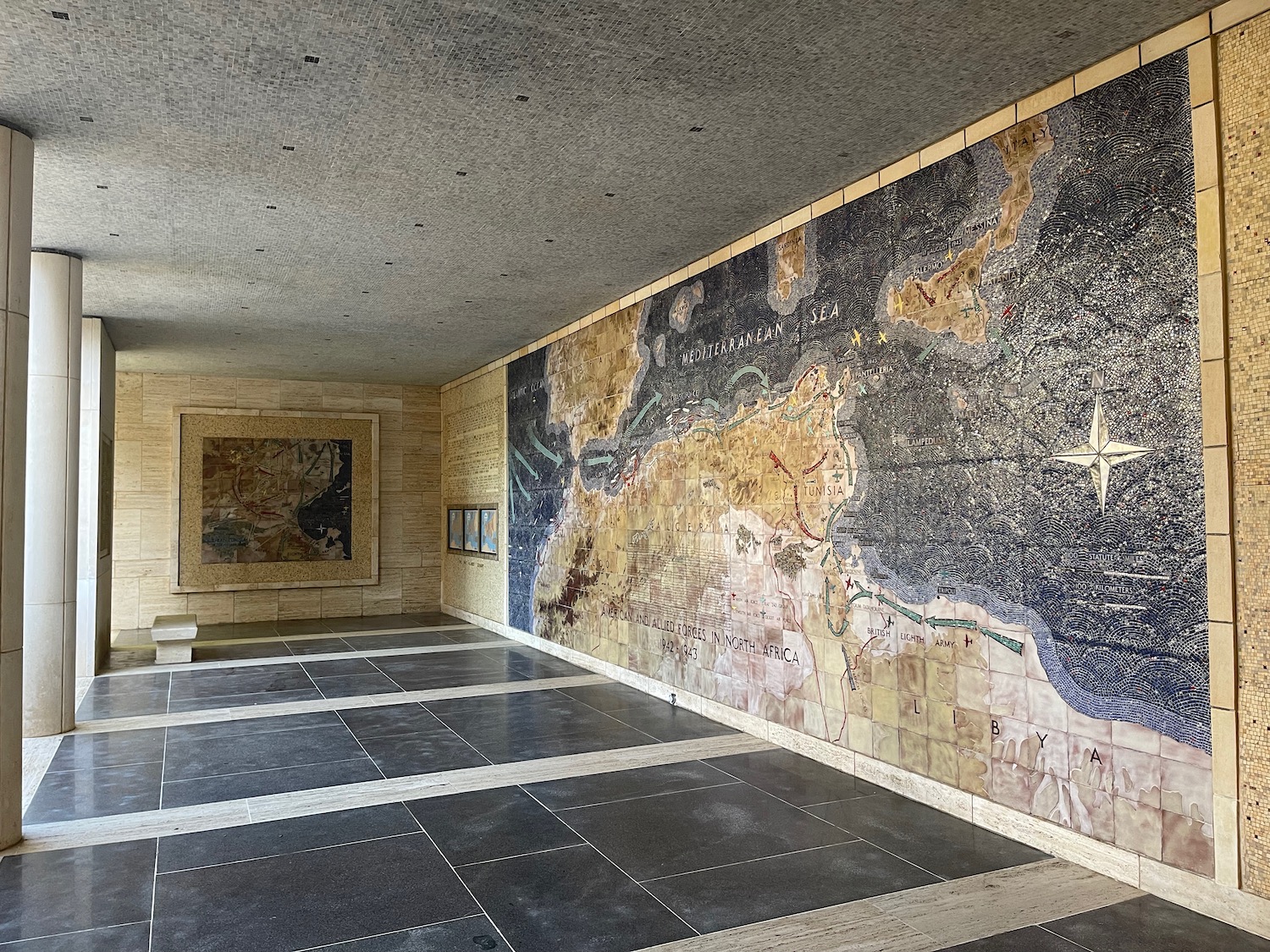 a large room with a map on the wall