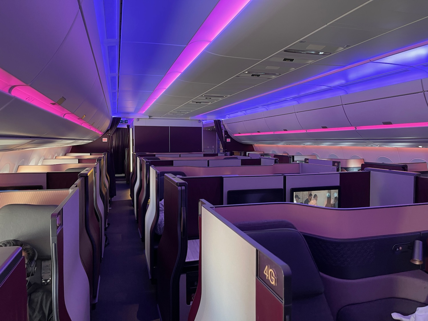 an airplane with purple and white seats