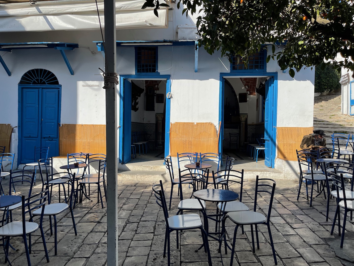 a tables and chairs outside of a building