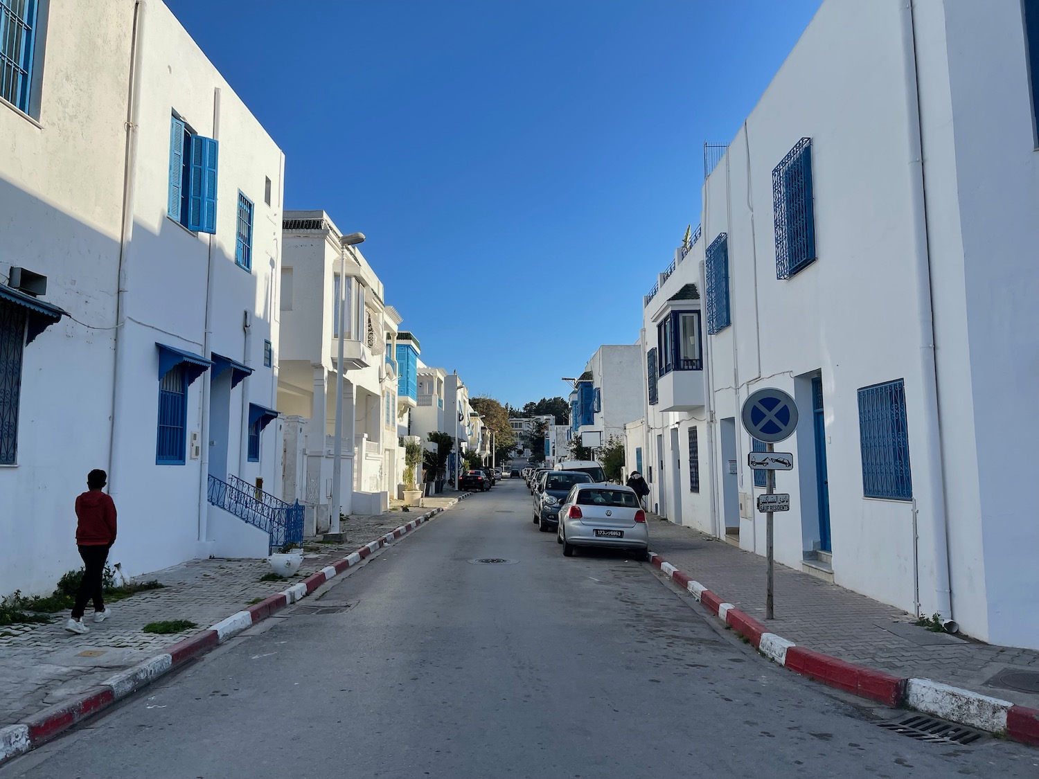 a street with cars parked on it