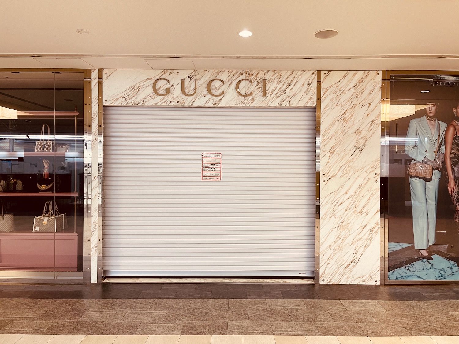 a store front with a rolling door