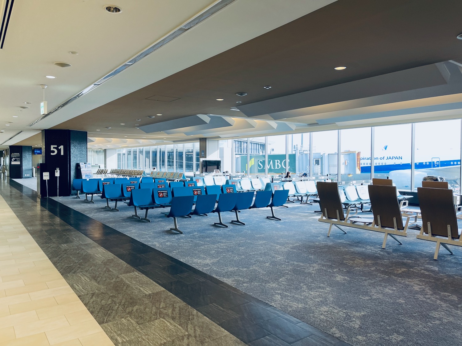 a large room with chairs and tables