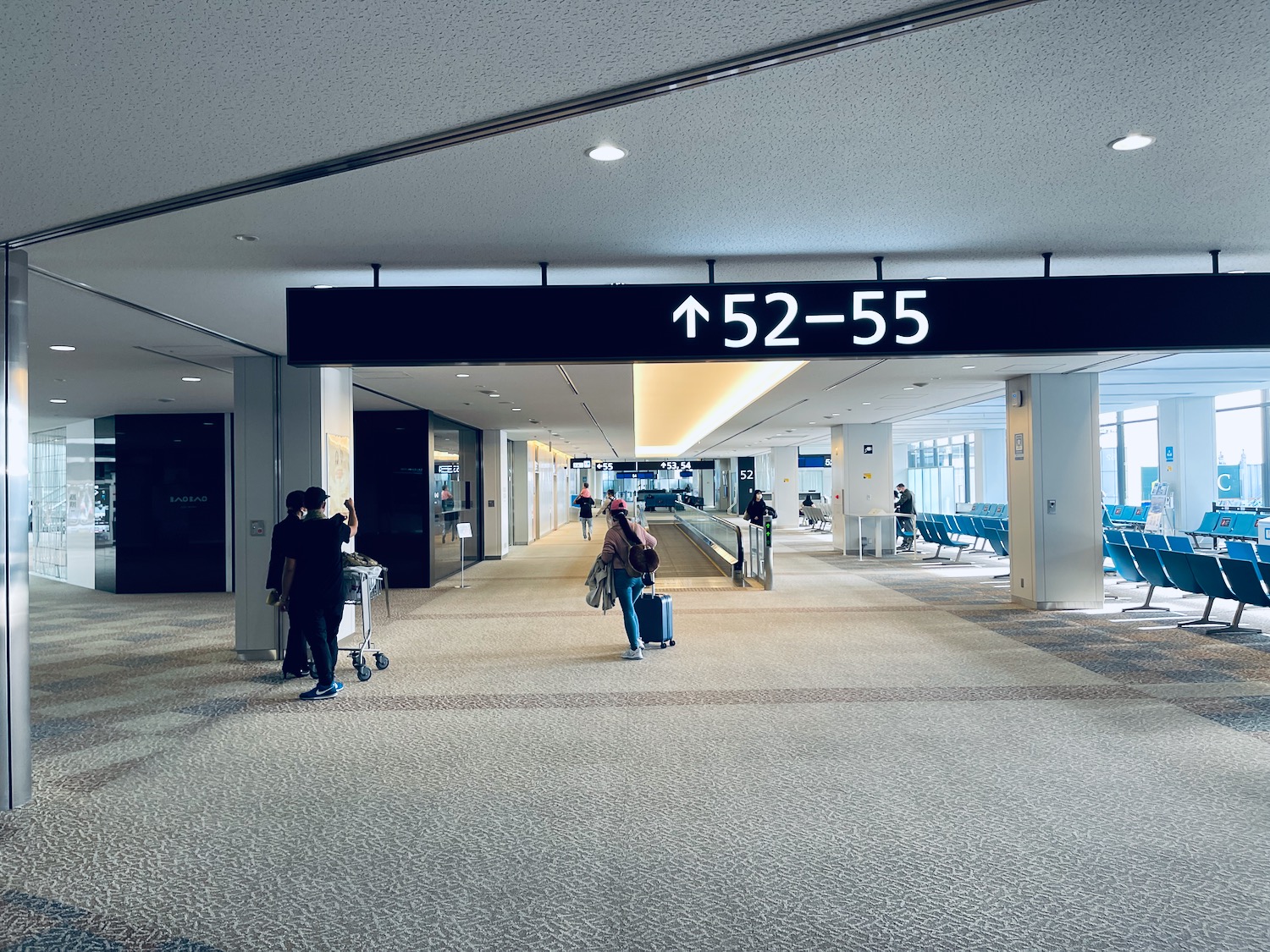 people walking in an airport