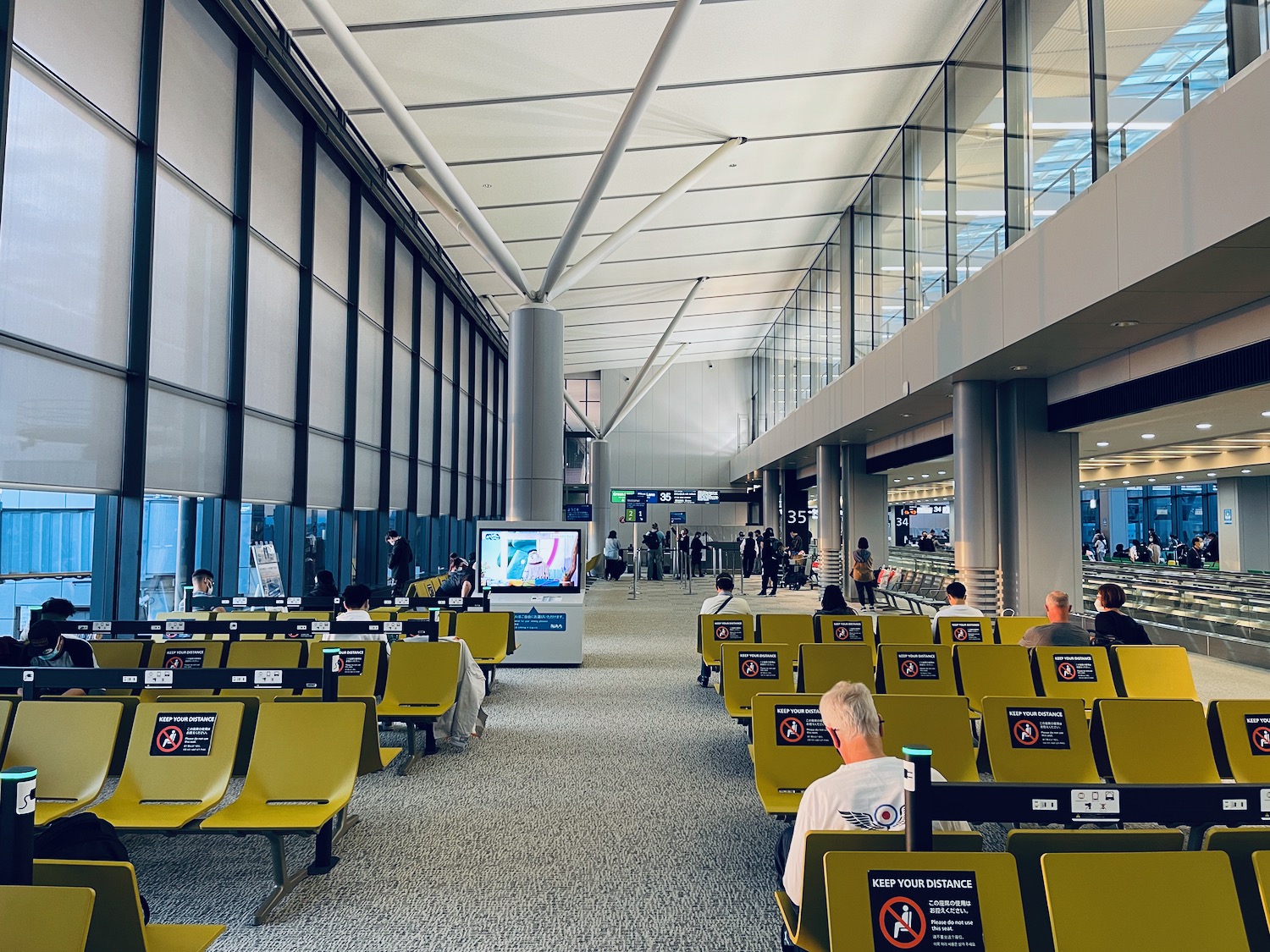 a group of people in an airport terminal