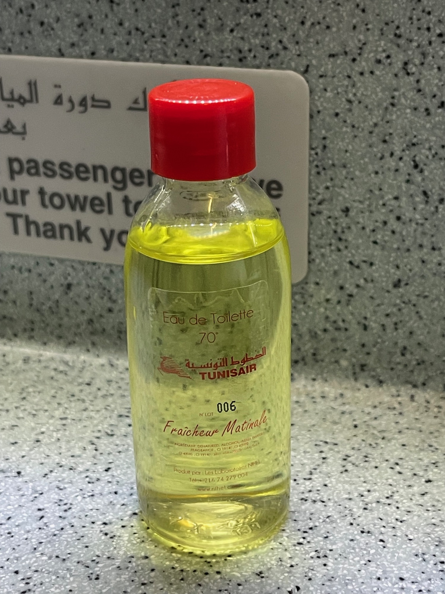 a bottle of liquid on a counter