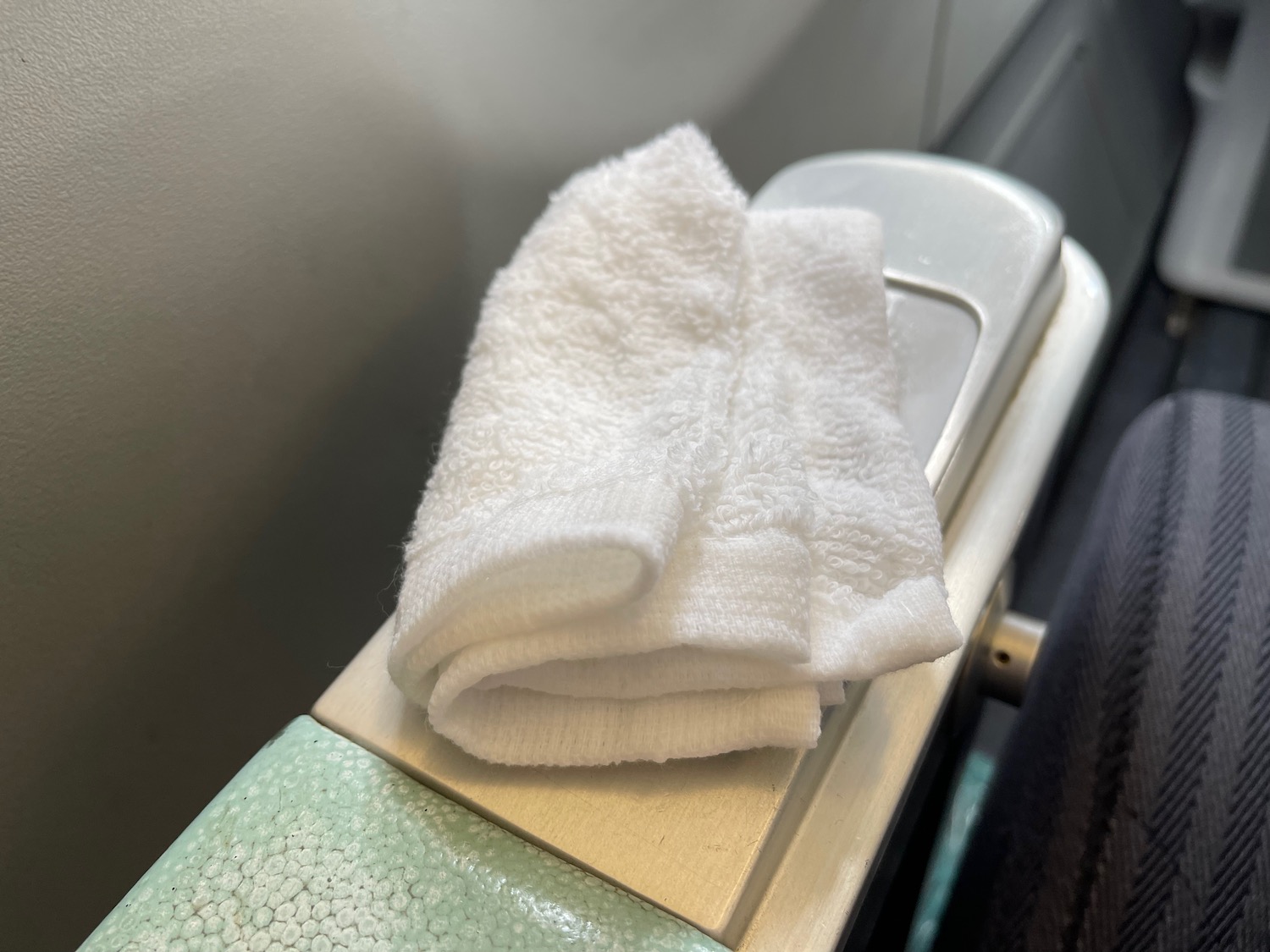 a white towel on a metal surface
