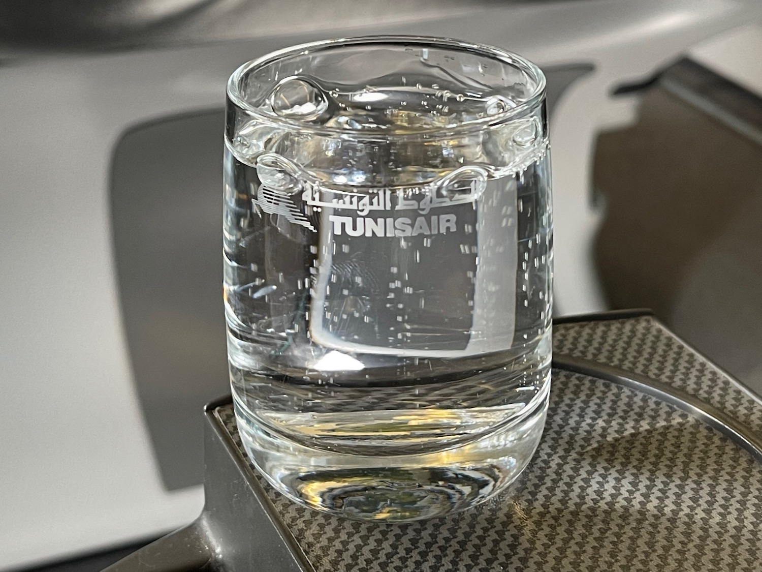 a glass of water on a table