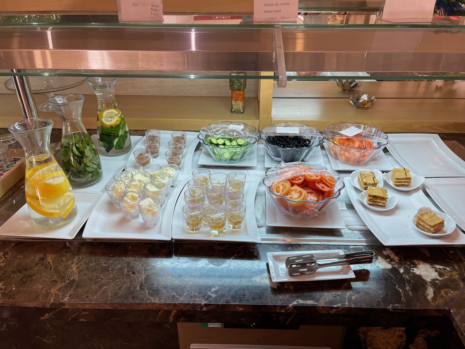 a buffet table with different food items on it