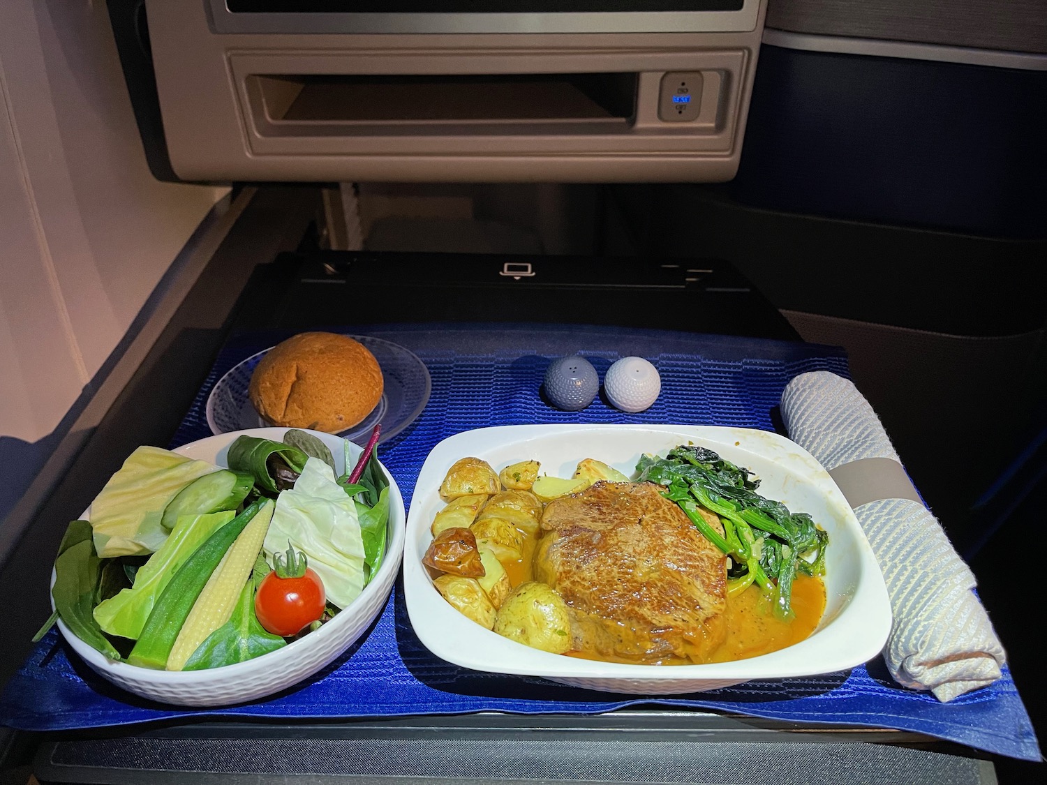 food on a tray in a plane