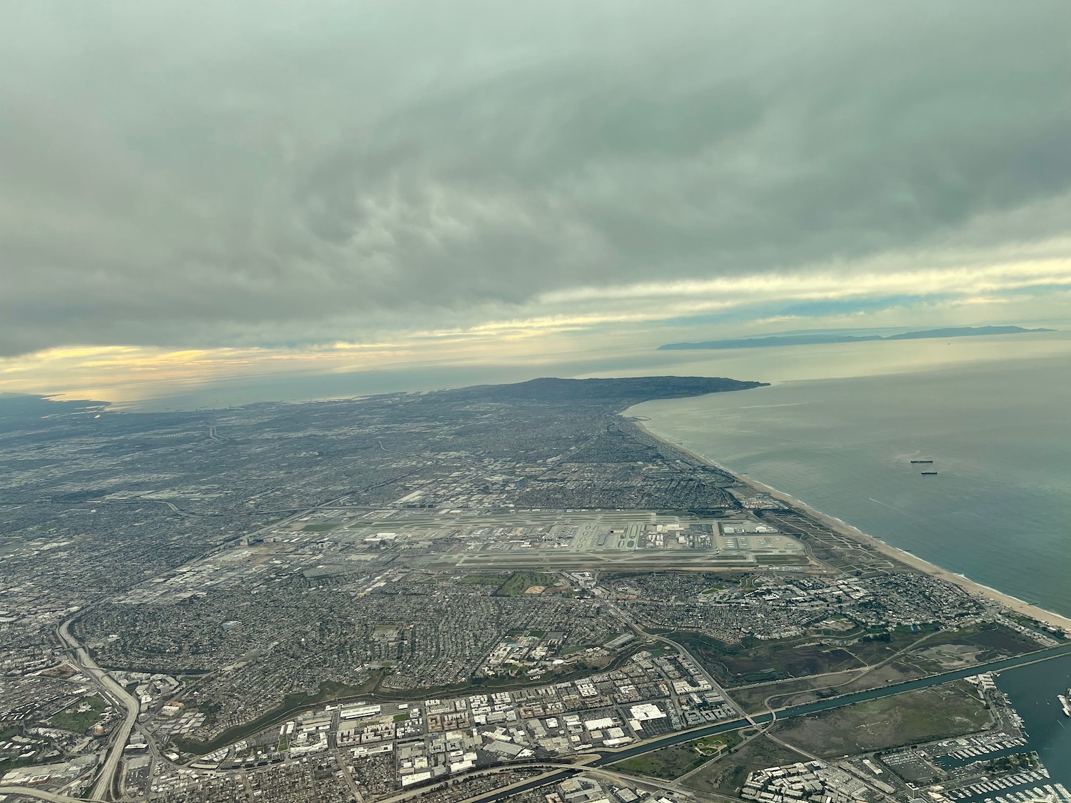 aerial view of a city and the ocean