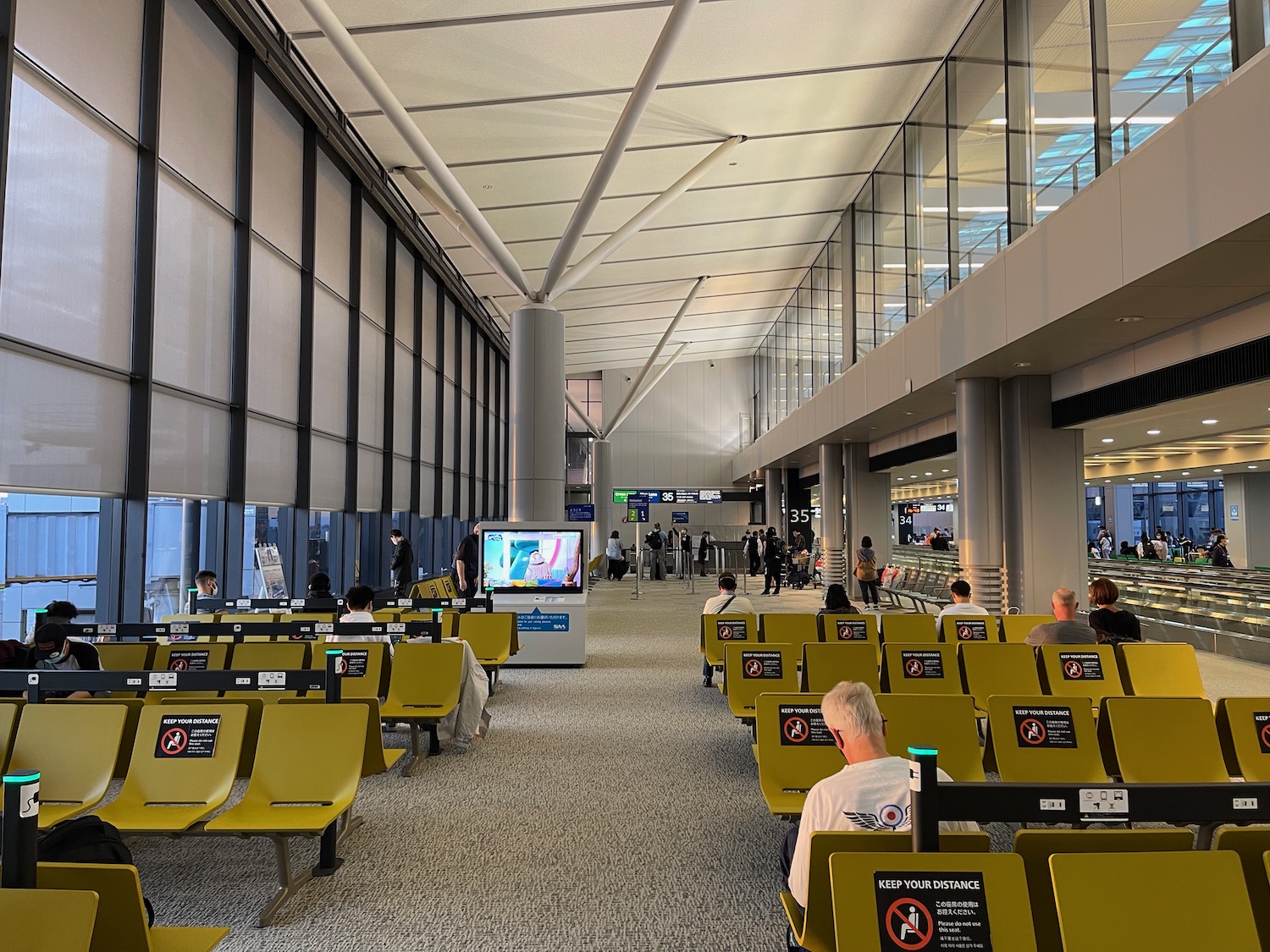 a group of people in an airport terminal