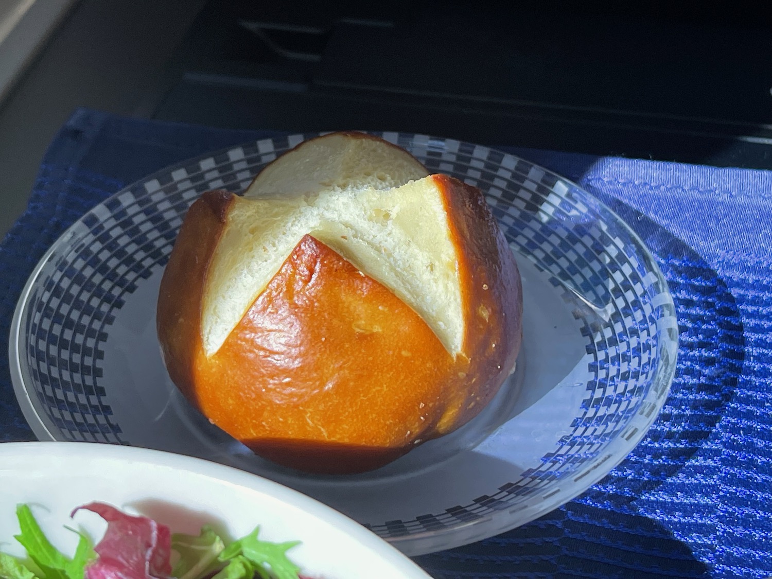 a bread roll on a plate