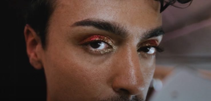 a man with glittery eyes