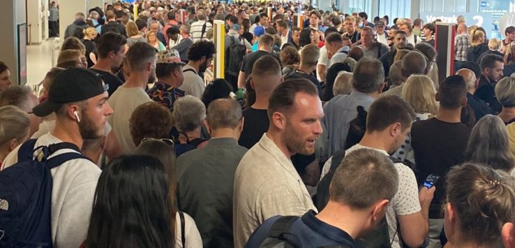 a large crowd of people in a building