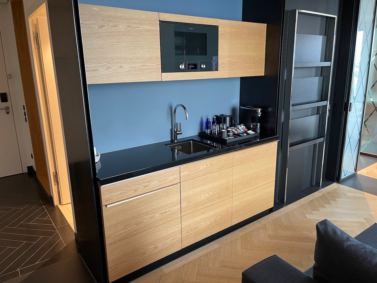 a kitchen with a sink and a microwave