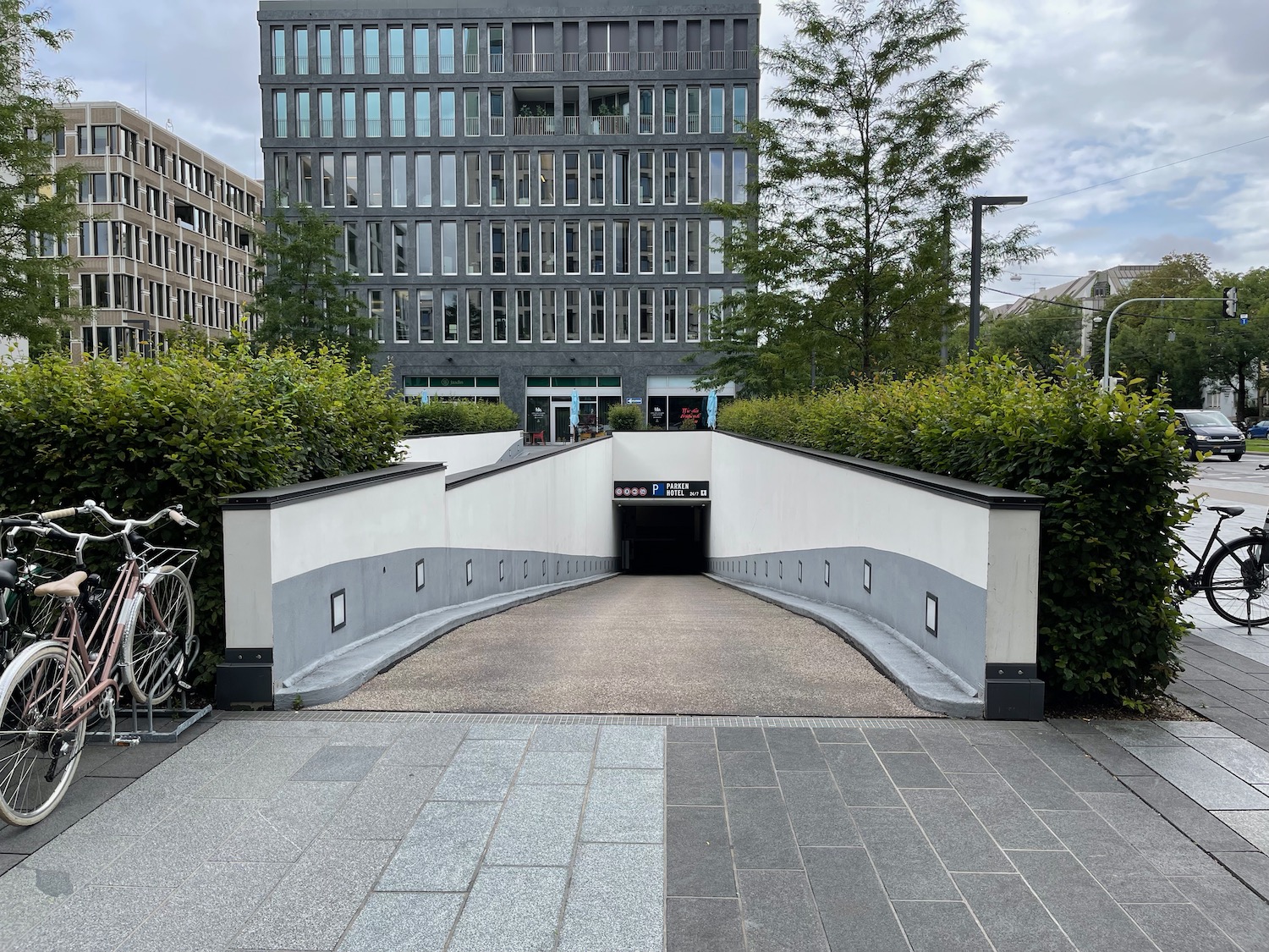 a tunnel with a building in the background