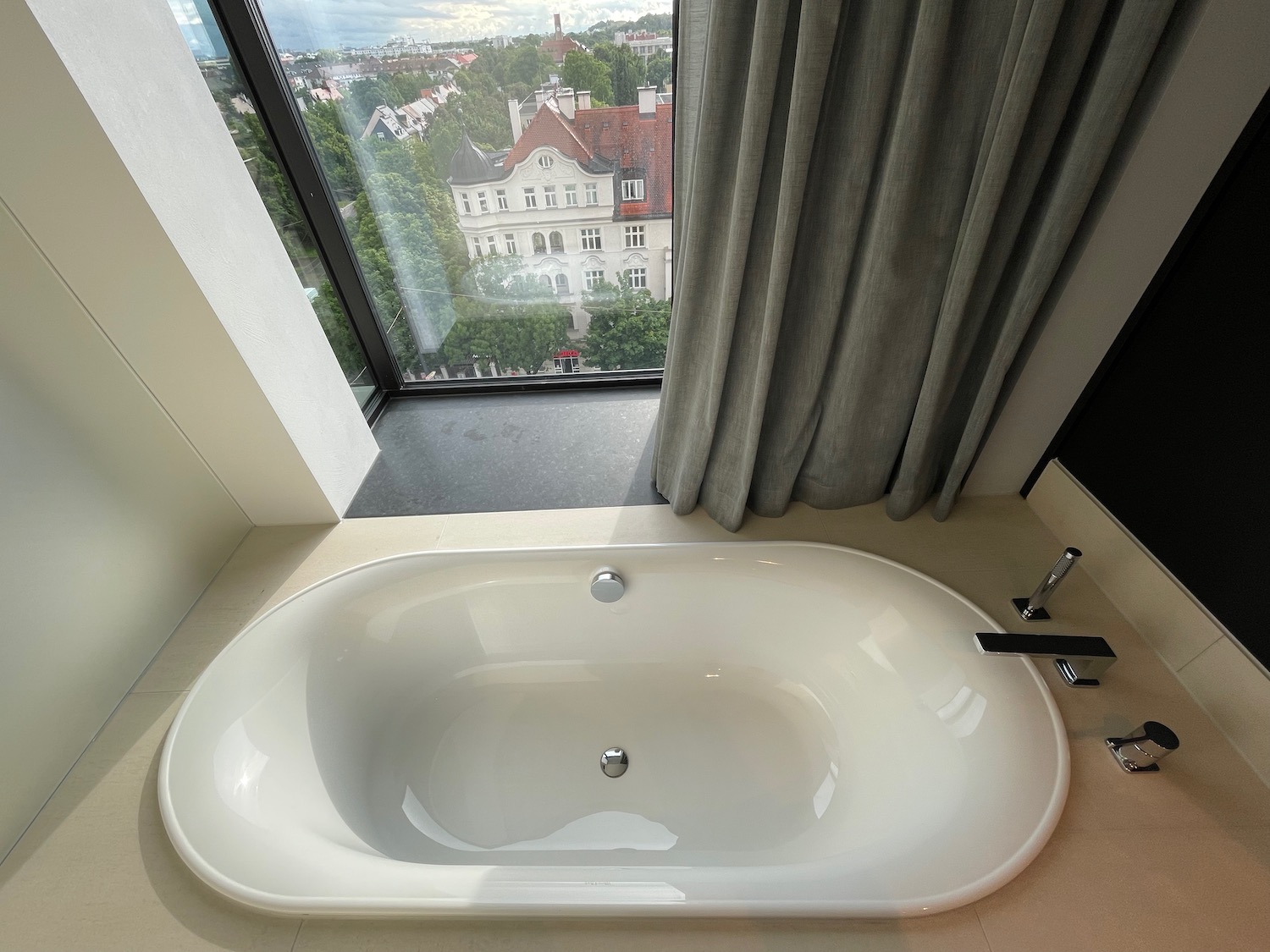 a white bathtub in a bathroom