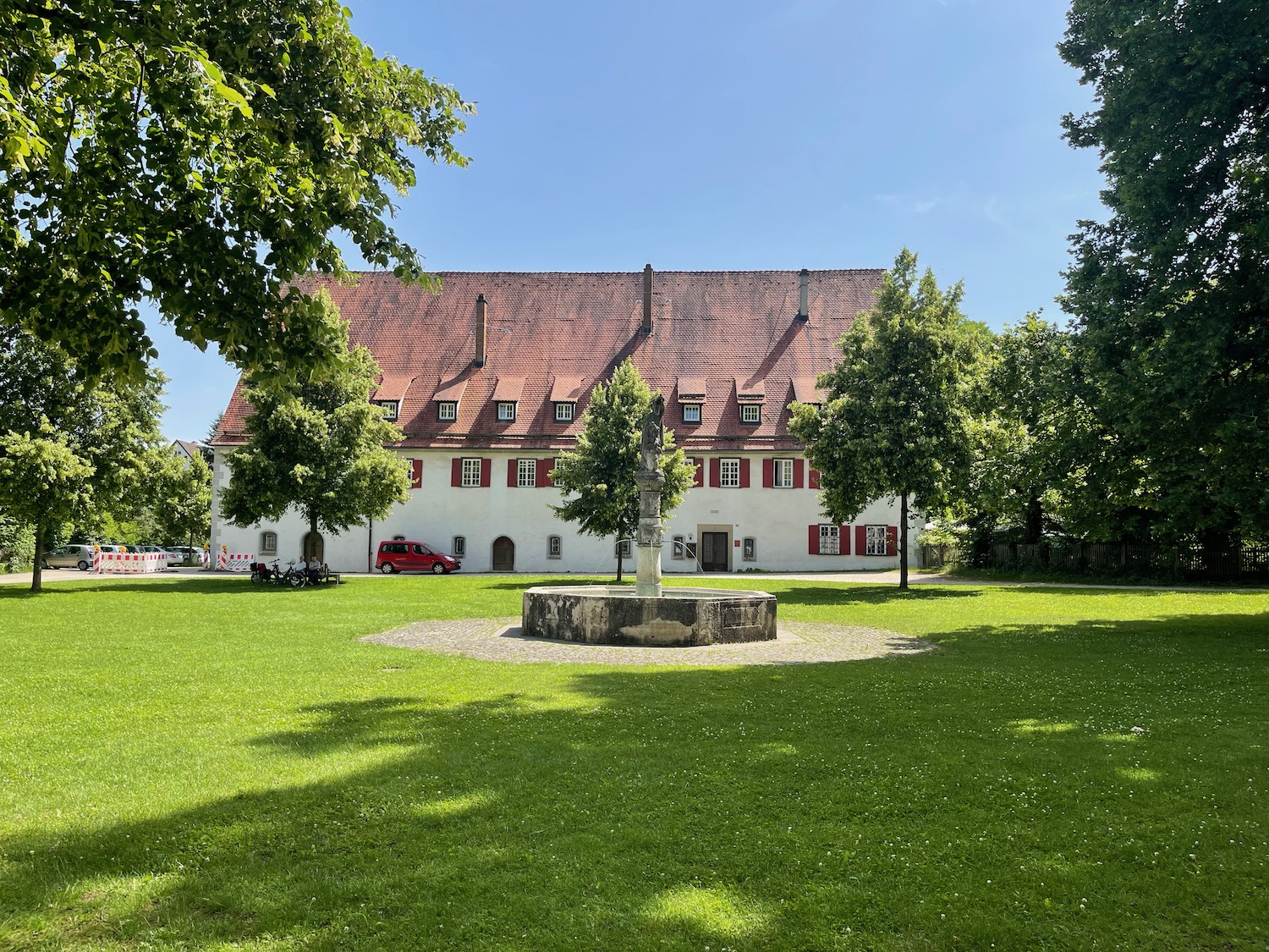 a building with a fountain in front of it