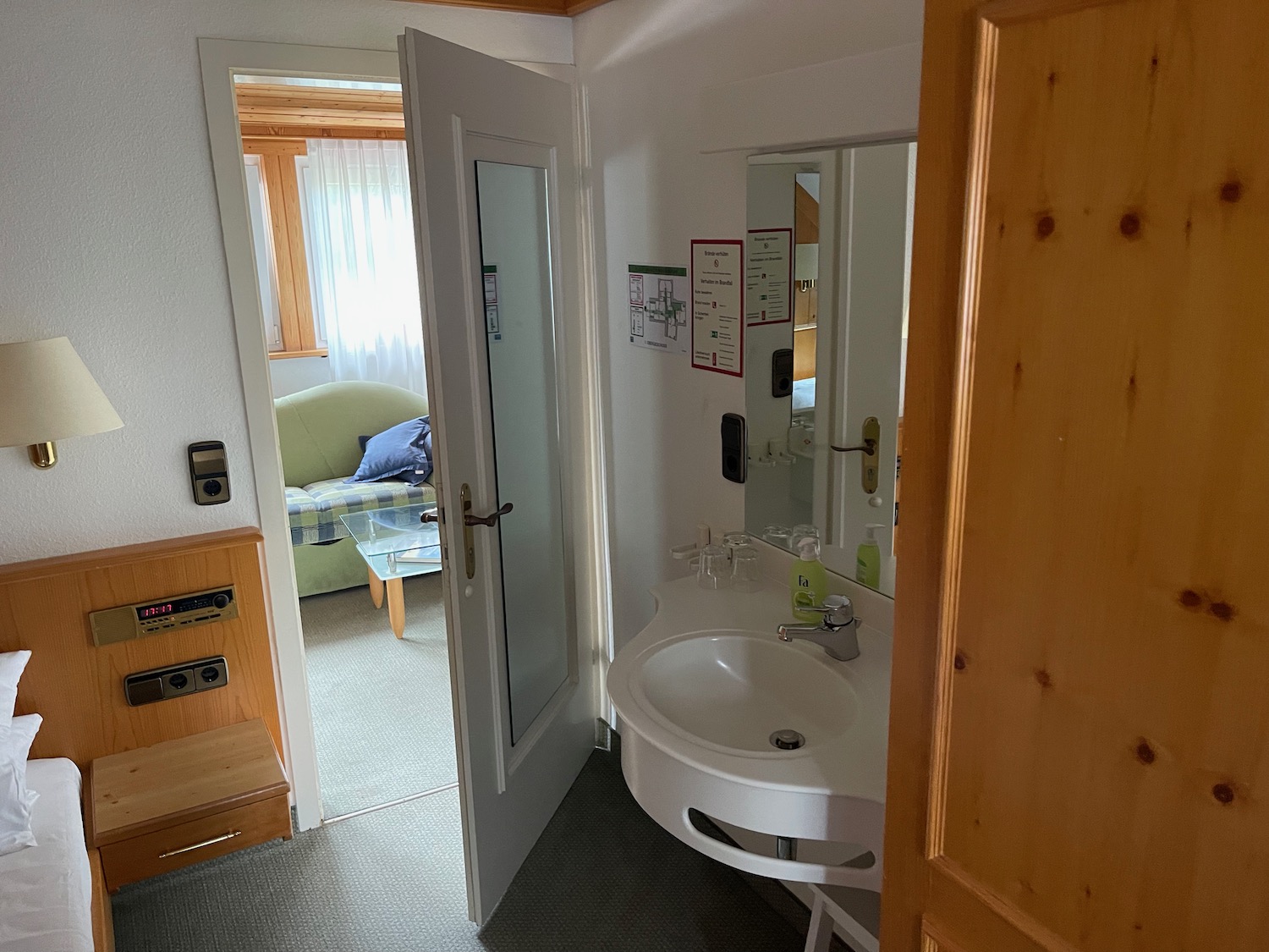 a bathroom with a sink and mirror