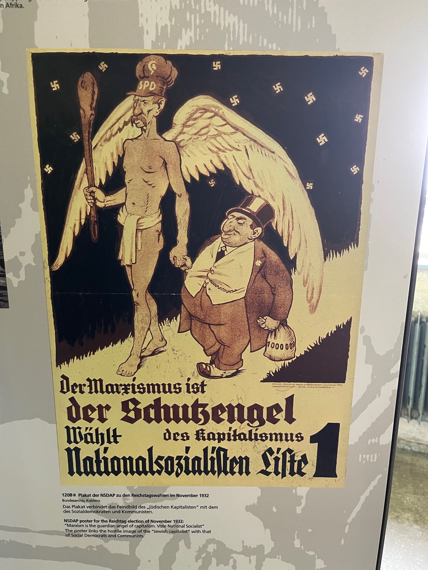 a poster with a man and angel