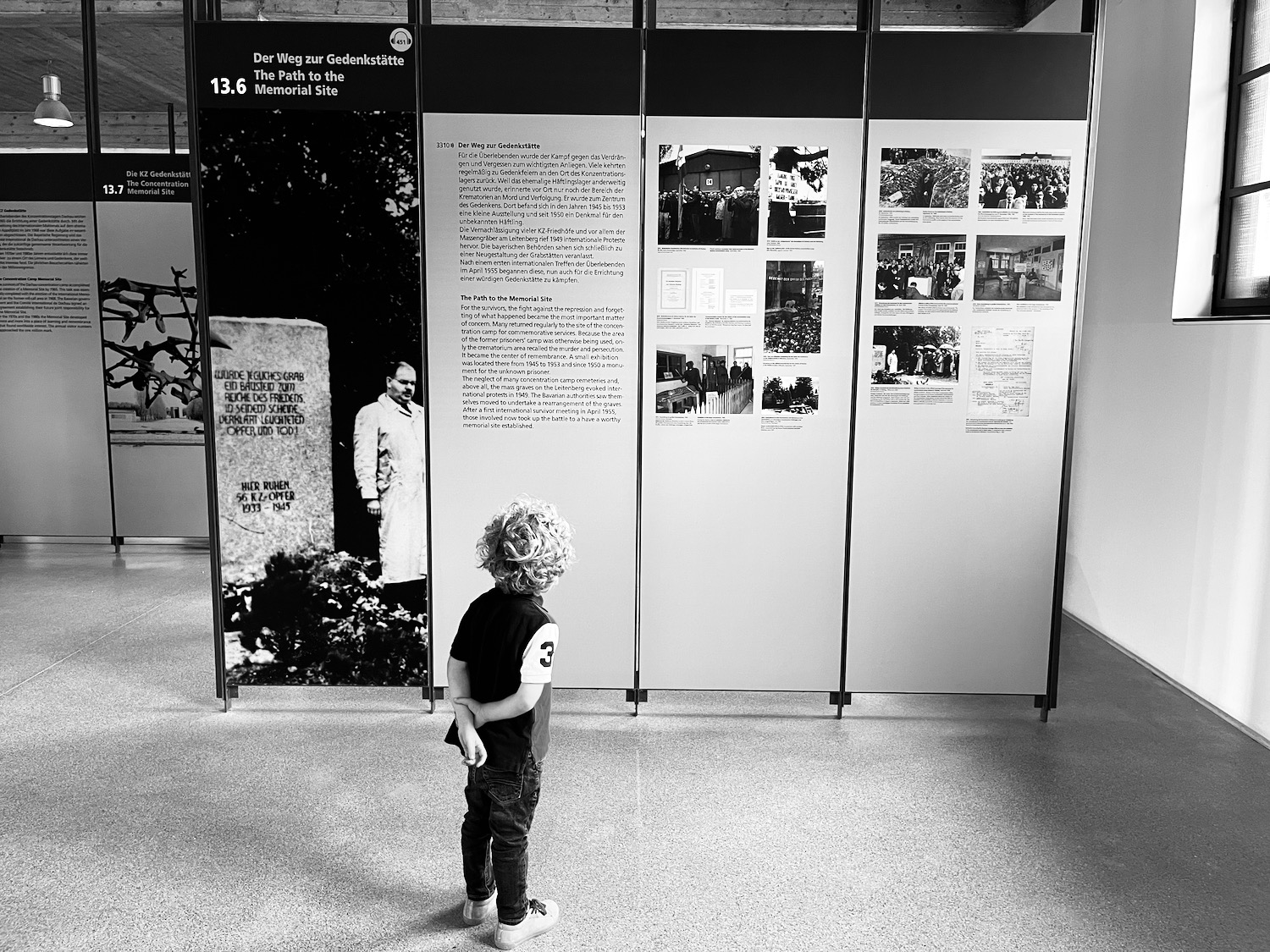 a child looking at a display