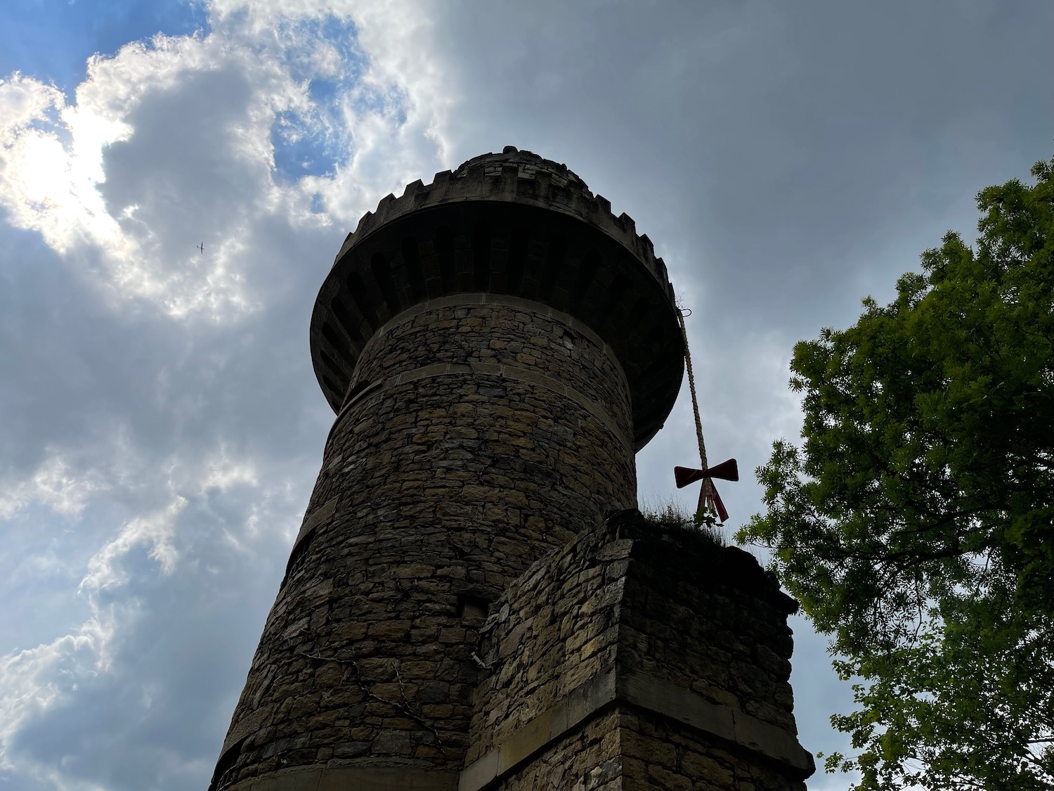 a tower with a red bow