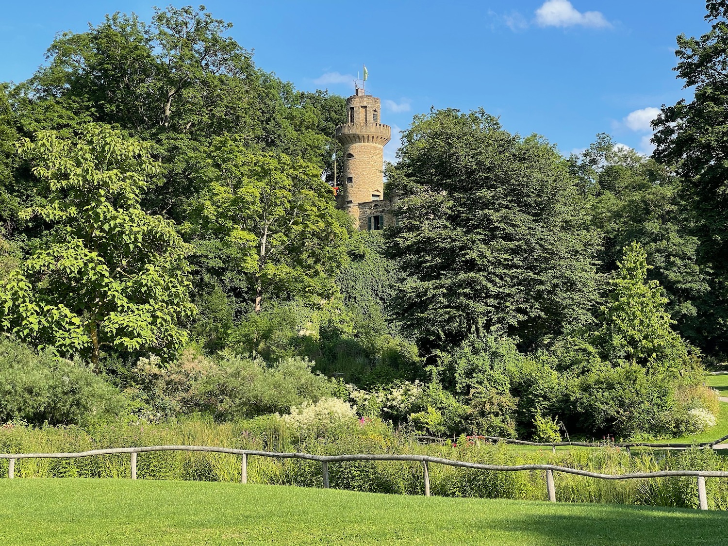 a stone tower in the woods