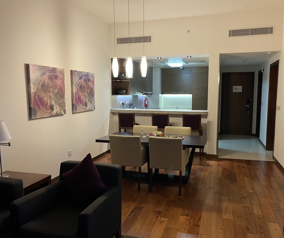 Hyatt Place Dubai Al Rigga living room to kitchen