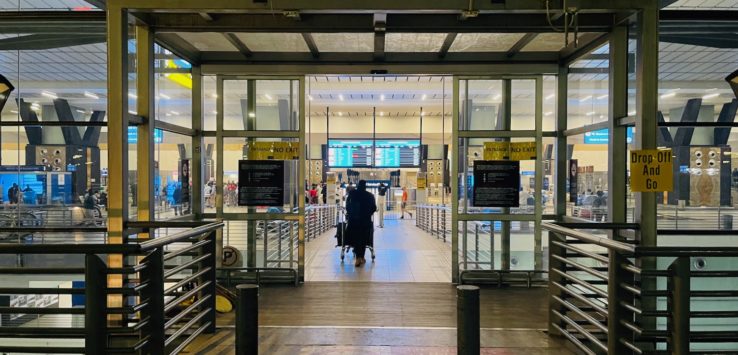 a person walking in a terminal