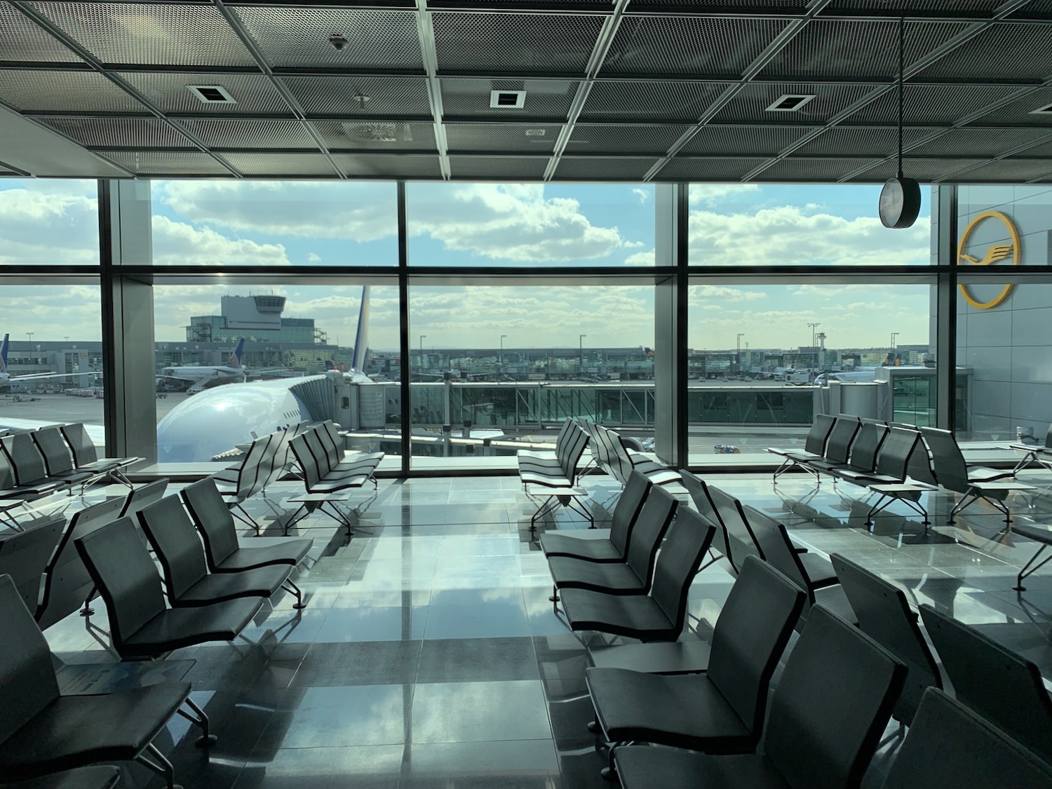 a room with chairs and windows